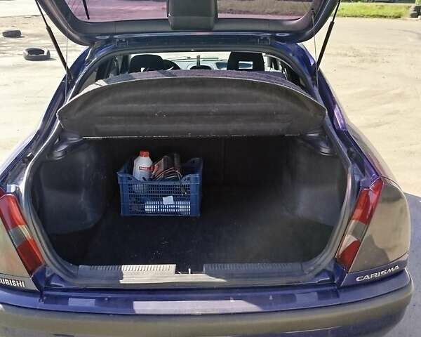 Синий Мицубиси Харизма, объемом двигателя 1.87 л и пробегом 270 тыс. км за 3000 $, фото 5 на Automoto.ua