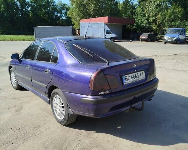 Синий Мицубиси Харизма, объемом двигателя 1.87 л и пробегом 270 тыс. км за 3000 $, фото 2 на Automoto.ua