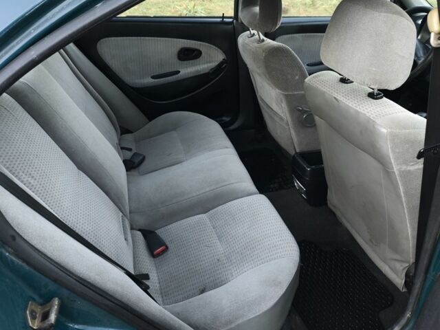 Зелений Міцубісі Харизма, об'ємом двигуна 1.6 л та пробігом 357 тис. км за 1499 $, фото 6 на Automoto.ua