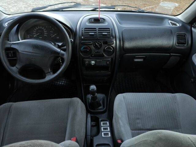 Зелений Міцубісі Харизма, об'ємом двигуна 1.6 л та пробігом 357 тис. км за 1499 $, фото 21 на Automoto.ua