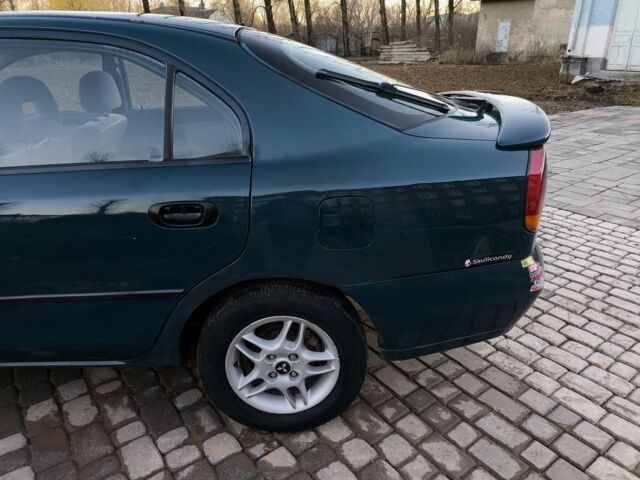 Зелений Міцубісі Харизма, об'ємом двигуна 1.6 л та пробігом 357 тис. км за 1499 $, фото 22 на Automoto.ua