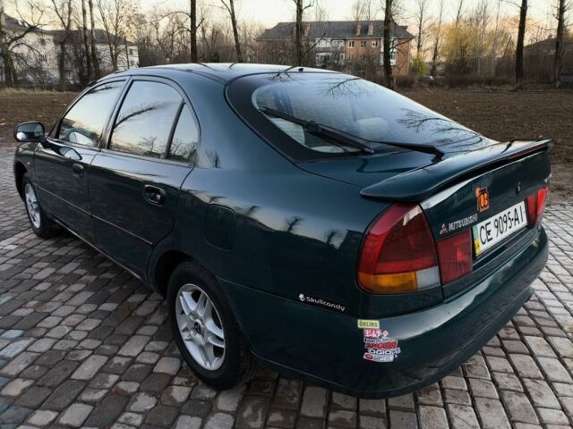 Зелений Міцубісі Харизма, об'ємом двигуна 1.6 л та пробігом 357 тис. км за 1499 $, фото 2 на Automoto.ua