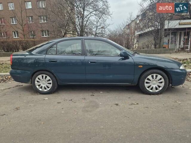 Зелений Міцубісі Харизма, об'ємом двигуна 1.8 л та пробігом 621 тис. км за 1399 $, фото 2 на Automoto.ua