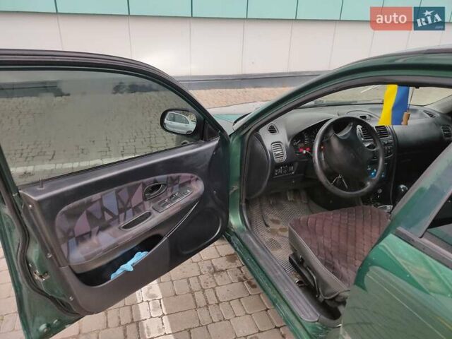 Зеленый Мицубиси Харизма, объемом двигателя 1.83 л и пробегом 255 тыс. км за 3500 $, фото 21 на Automoto.ua
