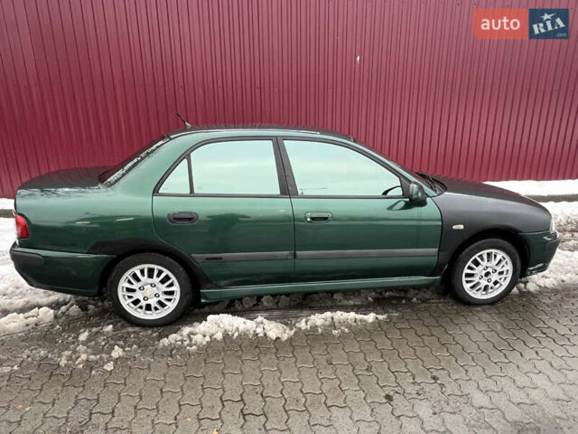 Зелений Міцубісі Харизма, об'ємом двигуна 1.8 л та пробігом 314 тис. км за 2000 $, фото 5 на Automoto.ua