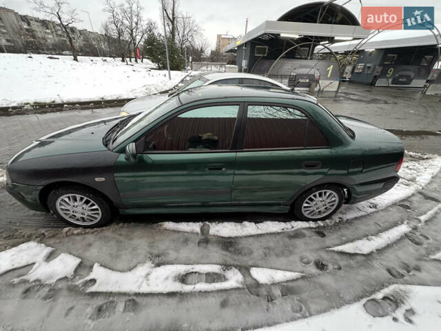Зелений Міцубісі Харизма, об'ємом двигуна 1.8 л та пробігом 314 тис. км за 2000 $, фото 2 на Automoto.ua
