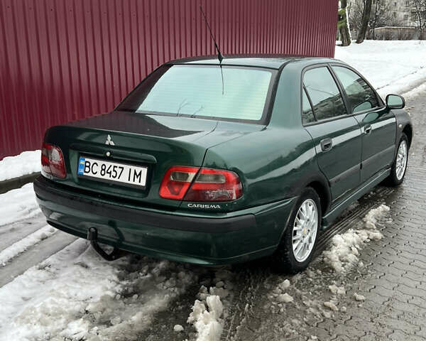 Зелений Міцубісі Харизма, об'ємом двигуна 1.8 л та пробігом 314 тис. км за 2000 $, фото 6 на Automoto.ua