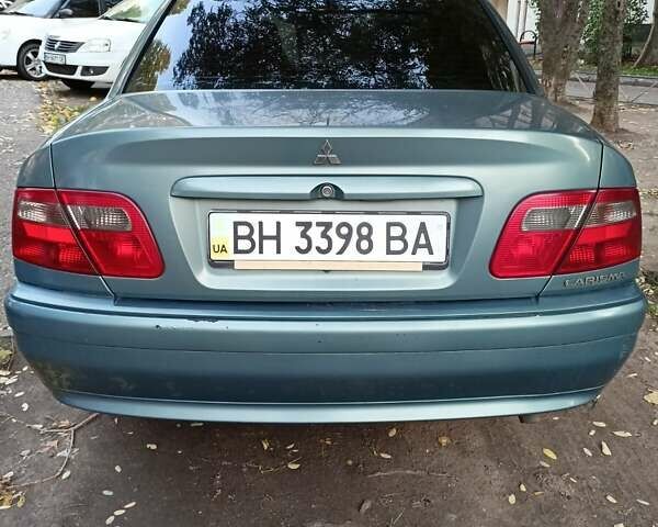 Зеленый Мицубиси Харизма, объемом двигателя 1.6 л и пробегом 281 тыс. км за 3900 $, фото 3 на Automoto.ua