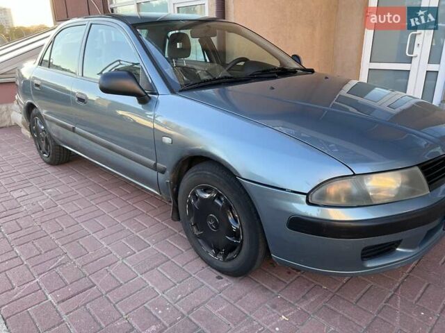 Зеленый Мицубиси Харизма, объемом двигателя 1.6 л и пробегом 193 тыс. км за 3456 $, фото 3 на Automoto.ua