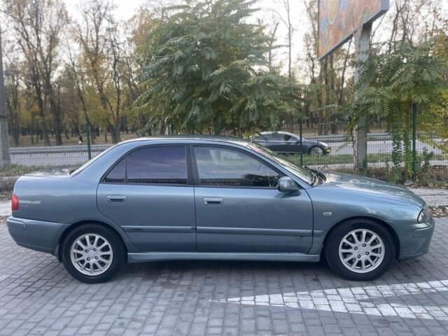 Міцубісі Харизма 2003 у Дніпро (Дніпропетровську) на Automoto.ua Зелений Міцубісі Харизма, об'ємом двигуна 1.6 л та пробігом 267 тис. км за 2700 $, фото 2 на Automoto.ua