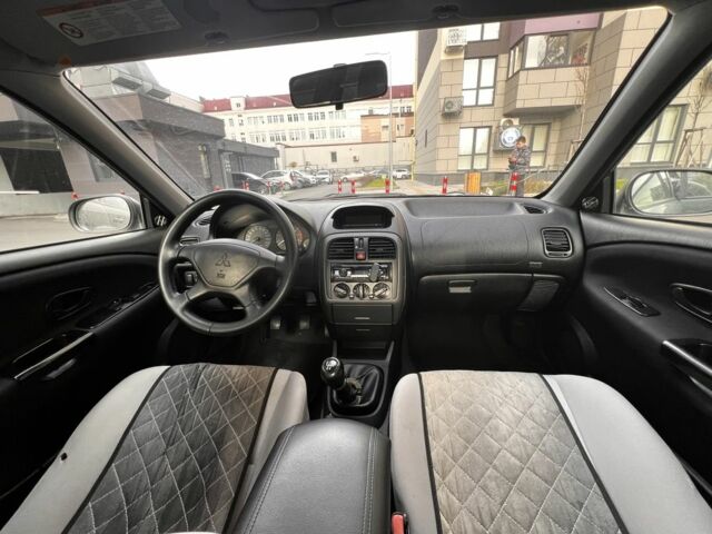 Зеленый Мицубиси Харизма, объемом двигателя 1.6 л и пробегом 211 тыс. км за 3200 $, фото 8 на Automoto.ua