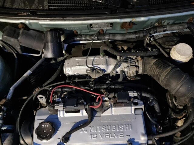 Зеленый Мицубиси Харизма, объемом двигателя 1.6 л и пробегом 220 тыс. км за 3200 $, фото 7 на Automoto.ua