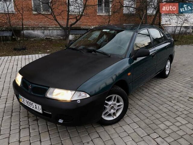 Зеленый Мицубиси Харизма, объемом двигателя 1.6 л и пробегом 357 тыс. км за 1480 $, фото 10 на Automoto.ua