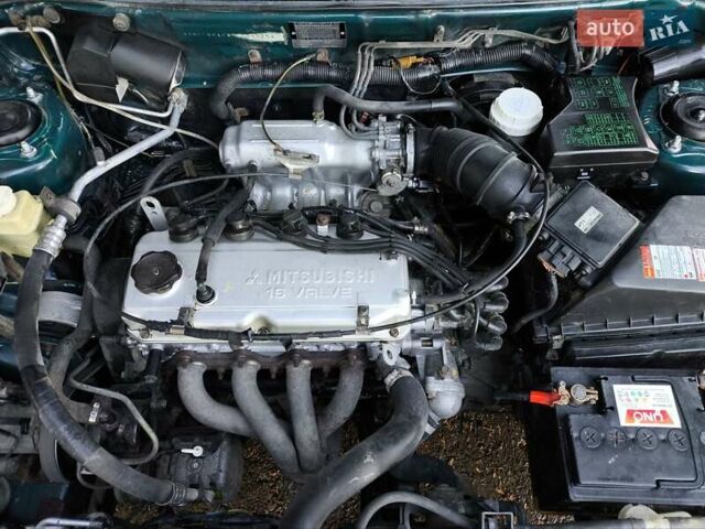 Зелений Міцубісі Харизма, об'ємом двигуна 1.6 л та пробігом 357 тис. км за 1399 $, фото 17 на Automoto.ua