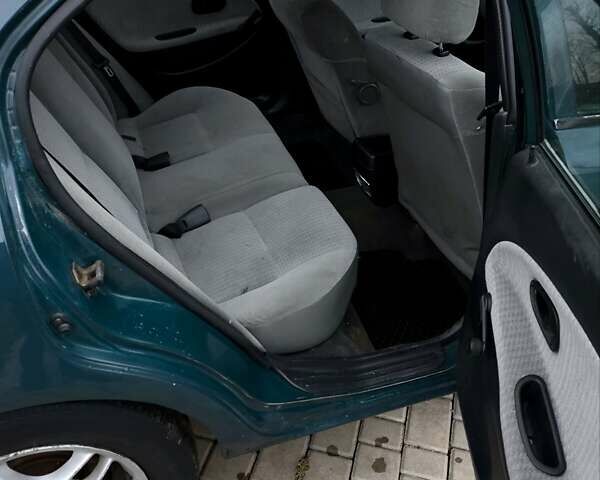 Зелений Міцубісі Харизма, об'ємом двигуна 1.6 л та пробігом 357 тис. км за 1399 $, фото 13 на Automoto.ua