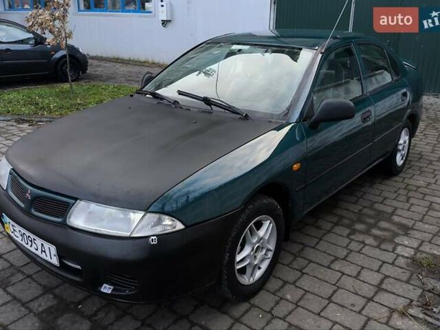 Зелений Міцубісі Харизма, об'ємом двигуна 1.6 л та пробігом 357 тис. км за 1399 $, фото 2 на Automoto.ua