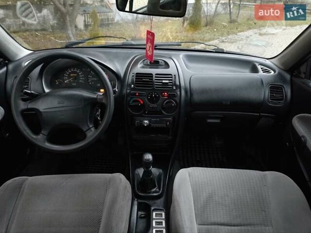 Зелений Міцубісі Харизма, об'ємом двигуна 1.6 л та пробігом 357 тис. км за 1399 $, фото 12 на Automoto.ua