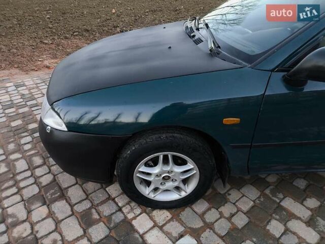 Зелений Міцубісі Харизма, об'ємом двигуна 1.6 л та пробігом 357 тис. км за 1499 $, фото 12 на Automoto.ua