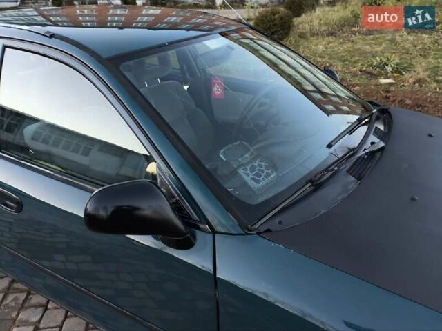 Зелений Міцубісі Харизма, об'ємом двигуна 1.6 л та пробігом 357 тис. км за 1499 $, фото 15 на Automoto.ua