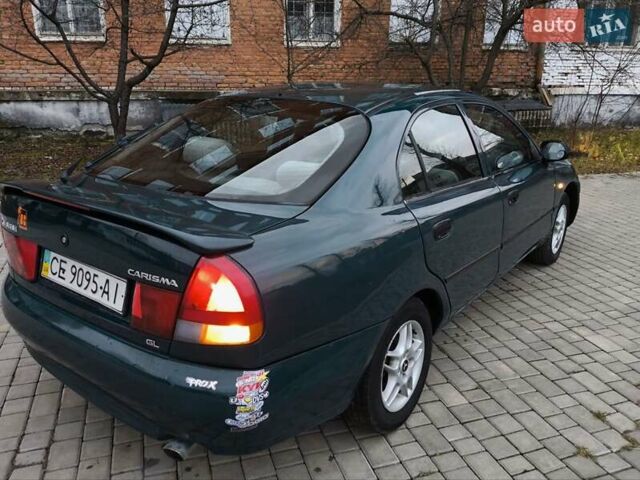 Зеленый Мицубиси Харизма, объемом двигателя 1.6 л и пробегом 357 тыс. км за 1480 $, фото 11 на Automoto.ua