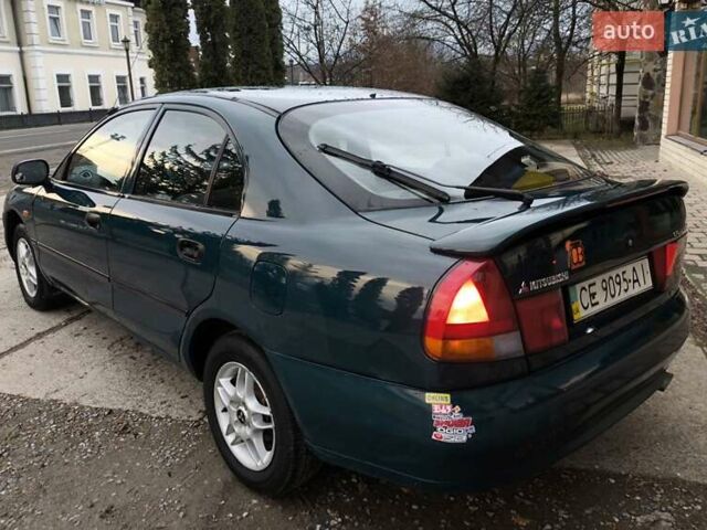 Зелений Міцубісі Харизма, об'ємом двигуна 1.6 л та пробігом 357 тис. км за 1480 $, фото 5 на Automoto.ua