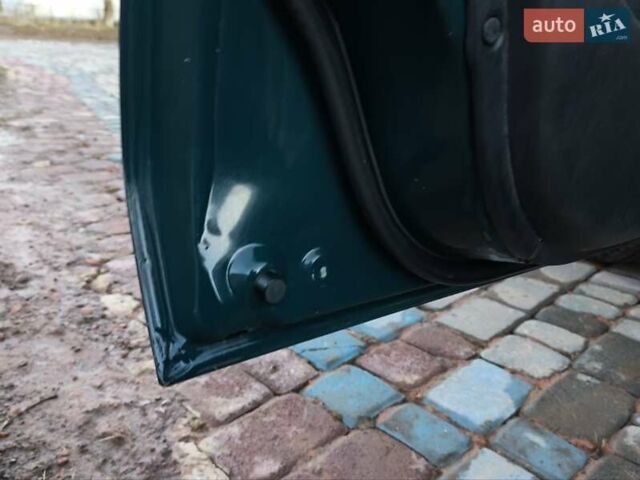 Зелений Міцубісі Харизма, об'ємом двигуна 1.6 л та пробігом 357 тис. км за 1499 $, фото 13 на Automoto.ua