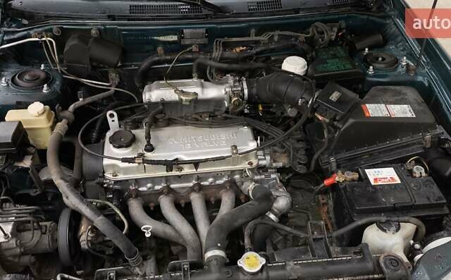 Зеленый Мицубиси Харизма, объемом двигателя 1.6 л и пробегом 357 тыс. км за 1480 $, фото 5 на Automoto.ua