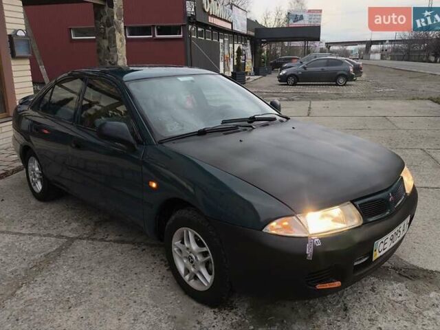 Зеленый Мицубиси Харизма, объемом двигателя 1.6 л и пробегом 357 тыс. км за 1480 $, фото 7 на Automoto.ua