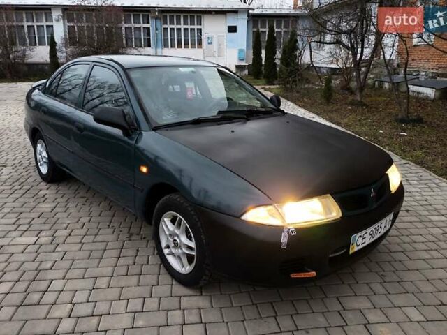 Зелений Міцубісі Харизма, об'ємом двигуна 1.6 л та пробігом 357 тис. км за 1480 $, фото 1 на Automoto.ua