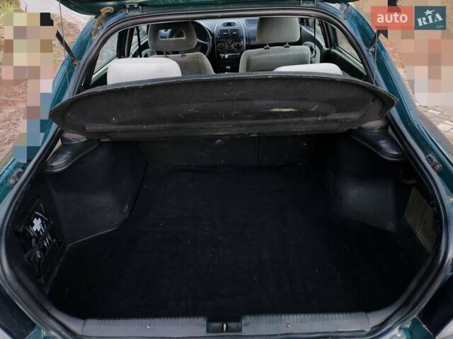 Зелений Міцубісі Харизма, об'ємом двигуна 1.6 л та пробігом 357 тис. км за 1399 $, фото 14 на Automoto.ua