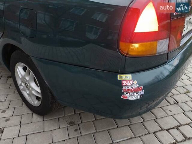 Зелений Міцубісі Харизма, об'ємом двигуна 1.6 л та пробігом 357 тис. км за 1480 $, фото 14 на Automoto.ua