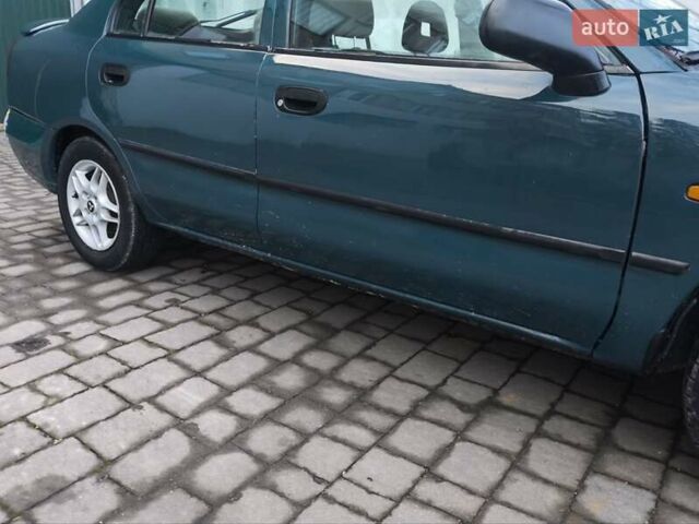 Зелений Міцубісі Харизма, об'ємом двигуна 1.6 л та пробігом 357 тис. км за 1399 $, фото 9 на Automoto.ua