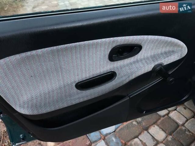 Зелений Міцубісі Харизма, об'ємом двигуна 1.6 л та пробігом 357 тис. км за 1499 $, фото 16 на Automoto.ua