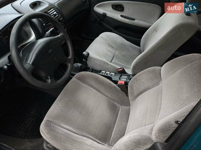 Зеленый Мицубиси Харизма, объемом двигателя 1.6 л и пробегом 357 тыс. км за 1480 $, фото 8 на Automoto.ua