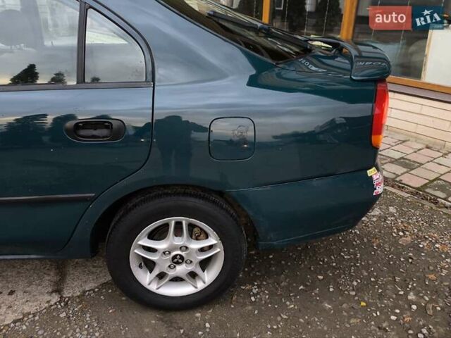 Зеленый Мицубиси Харизма, объемом двигателя 1.6 л и пробегом 357 тыс. км за 1480 $, фото 20 на Automoto.ua