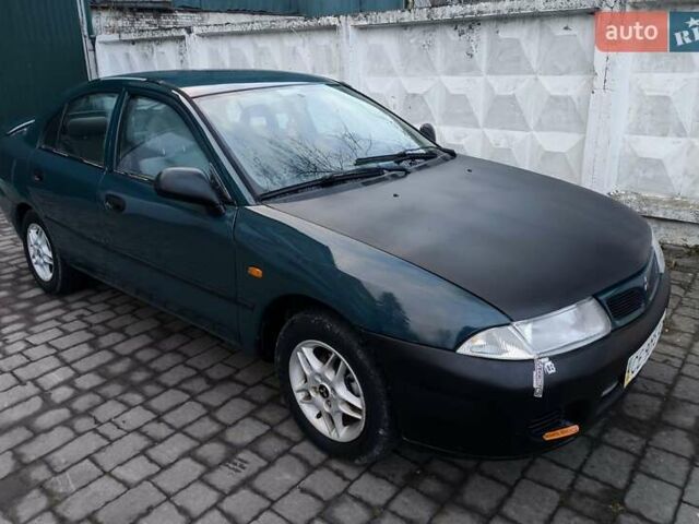 Зелений Міцубісі Харизма, об'ємом двигуна 1.6 л та пробігом 357 тис. км за 1399 $, фото 4 на Automoto.ua