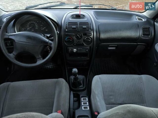 Зелений Міцубісі Харизма, об'ємом двигуна 1.6 л та пробігом 357 тис. км за 1499 $, фото 14 на Automoto.ua