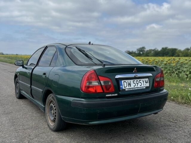 Зелений Міцубісі Харизма, об'ємом двигуна 1.9 л та пробігом 300 тис. км за 1429 $, фото 3 на Automoto.ua