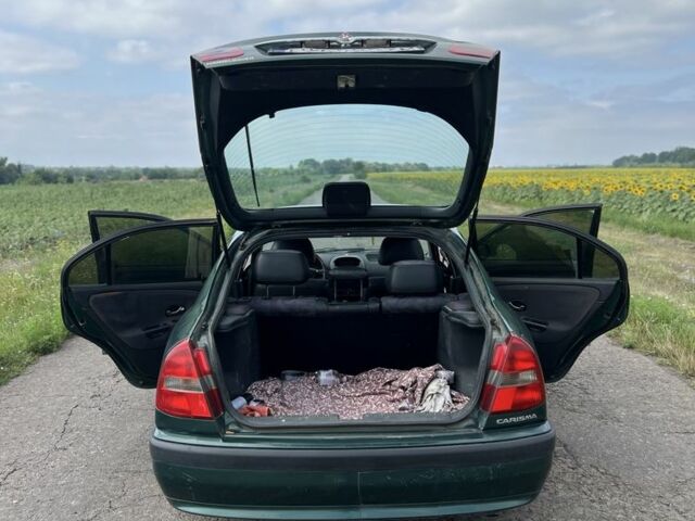 Зелений Міцубісі Харизма, об'ємом двигуна 1.9 л та пробігом 300 тис. км за 1429 $, фото 4 на Automoto.ua