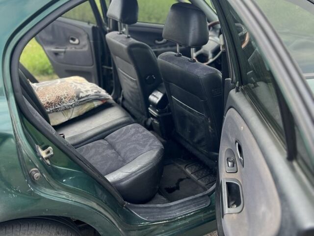 Зелений Міцубісі Харизма, об'ємом двигуна 1.9 л та пробігом 300 тис. км за 1429 $, фото 5 на Automoto.ua