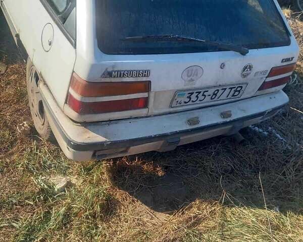 Белый Мицубиси Кольт, объемом двигателя 1.2 л и пробегом 215 тыс. км за 284 $, фото 3 на Automoto.ua