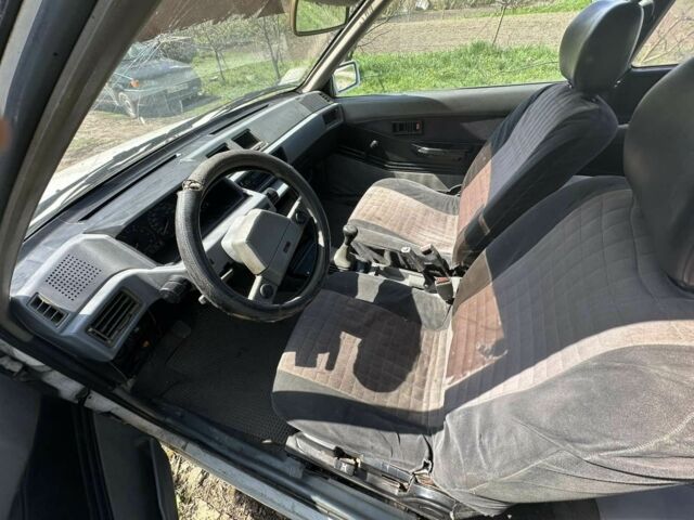 Мицубиси Кольт 1987 в Хмельницком на Automoto.ua Белый Мицубиси Кольт, объемом двигателя 0 л и пробегом 400 тыс. км за 480 $, фото 5 на Automoto.ua