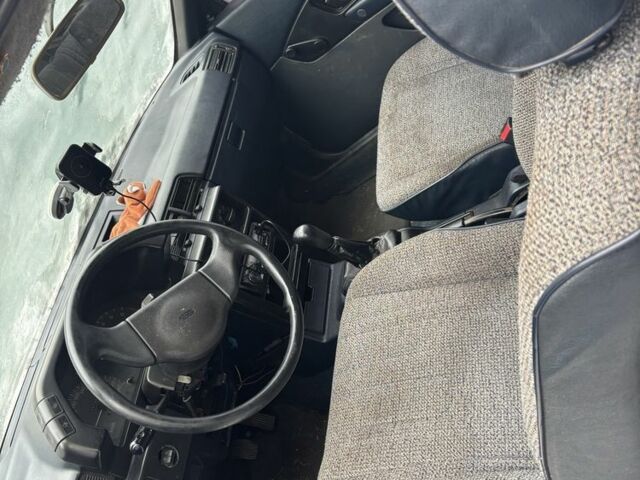 Белый Мицубиси Кольт, объемом двигателя 1.3 л и пробегом 3 тыс. км за 650 $, фото 4 на Automoto.ua