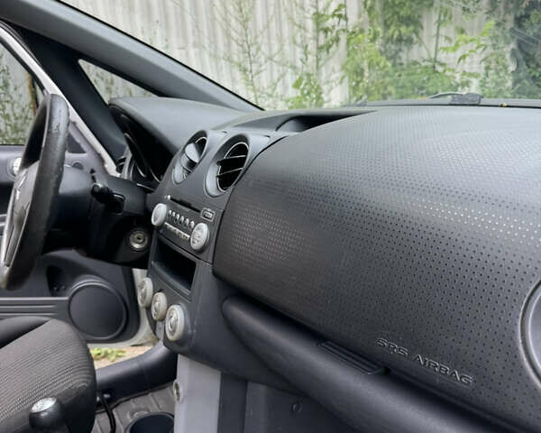 Білий Міцубісі Кольт, об'ємом двигуна 1.3 л та пробігом 168 тис. км за 3900 $, фото 14 на Automoto.ua
