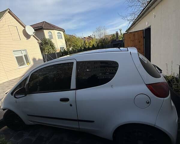 Белый Мицубиси Кольт, объемом двигателя 1.33 л и пробегом 305 тыс. км за 2500 $, фото 4 на Automoto.ua