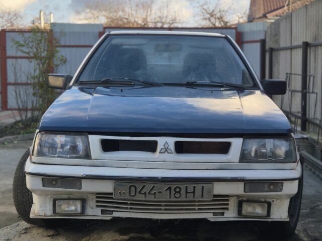 Білий Міцубісі Кольт, об'ємом двигуна 0 л та пробігом 100 тис. км за 800 $, фото 3 на Automoto.ua