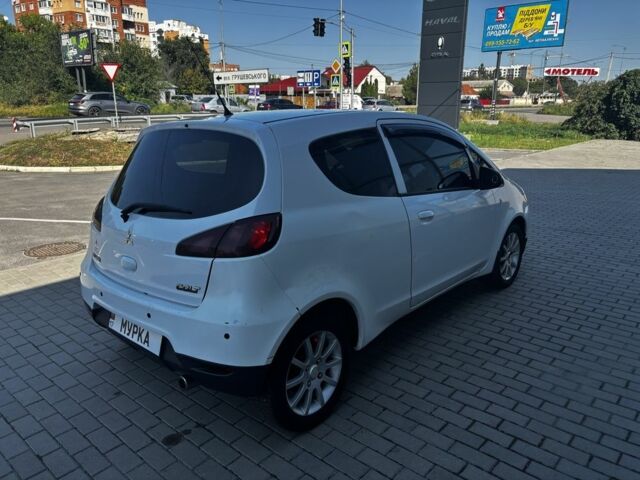 Белый Мицубиси Кольт, объемом двигателя 1.3 л и пробегом 79 тыс. км за 4400 $, фото 1 на Automoto.ua