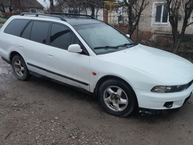 Белый Мицубиси Кольт, объемом двигателя 2 л и пробегом 300 тыс. км за 1500 $, фото 1 на Automoto.ua