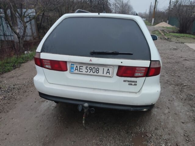 Белый Мицубиси Кольт, объемом двигателя 2 л и пробегом 300 тыс. км за 1500 $, фото 2 на Automoto.ua