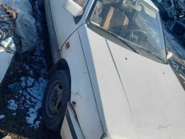 Белый Мицубиси Кольт, объемом двигателя 1.2 л и пробегом 215 тыс. км за 284 $, фото 2 на Automoto.ua